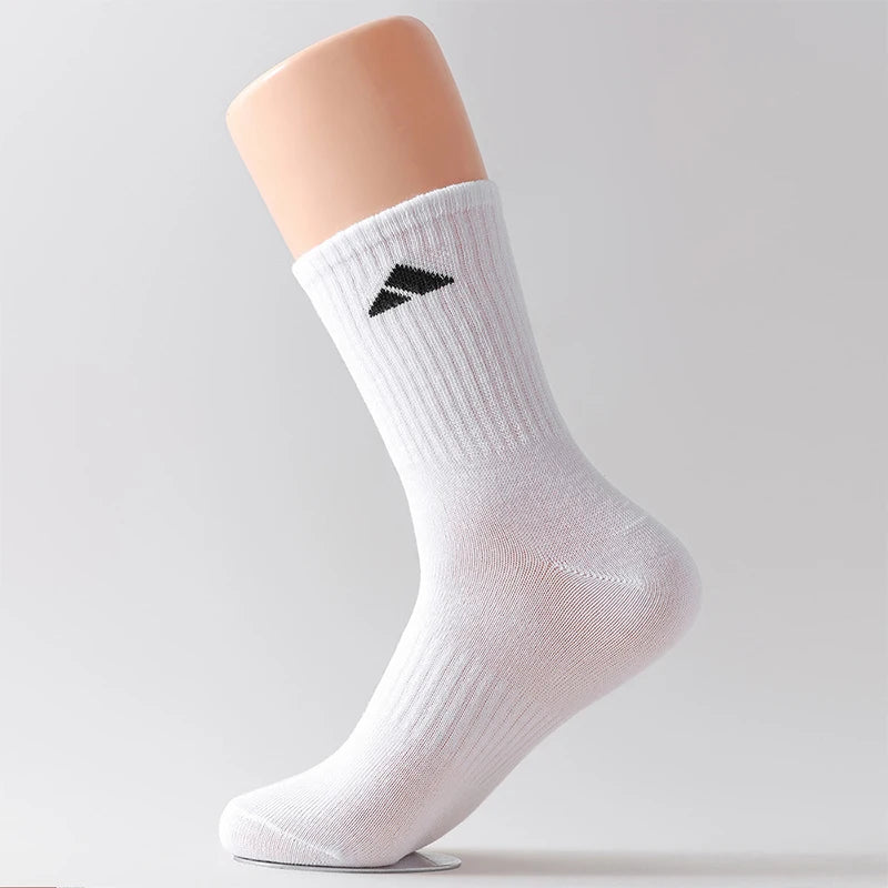 5 pairs of black and white patterned mid length socks